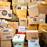 Lots of cardboard boxes. Photo by CHUTTERSNAP on Unsplash