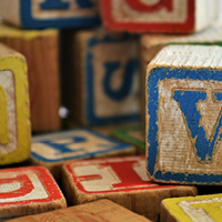 Assorted-color alphabet cube toys. Photo by Susan Holt Simpson on Unsplash