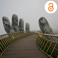 Wooden bridge with brass railings. Hand statue that looks like it is holding the bridge. Photo by Aleksandr Barsukov on Unsplash