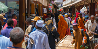  A busy street around the markets of Stone Town, Zanzibar, Tanzania. Photo by Aron Marinelli on Unsplash